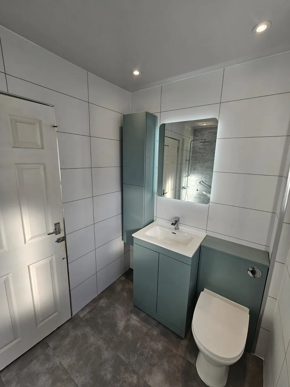Blue-grey vanity, basin and matching toilet unit